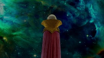 Movie still from “The SpongeBob Movie: Sponge Out of Water” (2015), directed by Mike Mitchell – An image of a person wearing a red robe and a gold star on the back; Extreme Wide shot, Low angle