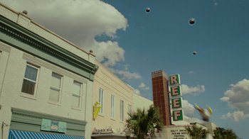 A building that is on the side of the street