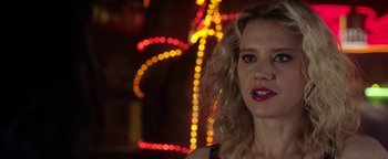 Movie still from “The Spy Who Dumped Me” (2018), directed by Susanna Fogel – A person wearing a black shirt; Close Up shot, Over the shoulder angle