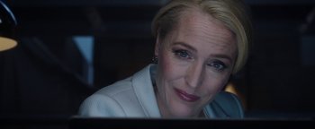 Movie still from “The Spy Who Dumped Me” (2018), directed by Susanna Fogel – A person sitting in front of a computer; Close Up shot, Over the shoulder angle
