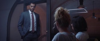 Movie still from “The Spy Who Dumped Me” (2018), directed by Susanna Fogel – A man and a woman are standing in front of each other; Medium shot, Over the shoulder angle