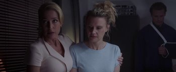 Movie still from “The Spy Who Dumped Me” (2018), directed by Susanna Fogel – Two women standing next to each other in a room; Medium shot, Over the shoulder angle
