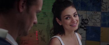 Movie still from “The Spy Who Dumped Me” (2018), directed by Susanna Fogel – A man and a woman smiling at each other; Close Up shot, Over the shoulder angle