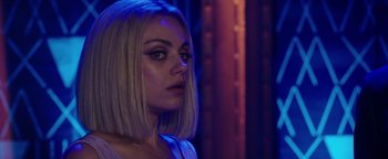 Movie still from “The Spy Who Dumped Me” (2018), directed by Susanna Fogel – A person wearing a white shirt; Close Up shot, Over the shoulder angle