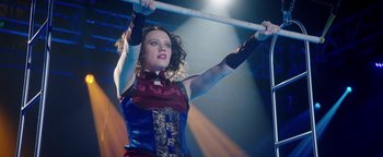 Movie still from “The Spy Who Dumped Me” (2018), directed by Susanna Fogel – A woman holding a pole in the middle of a ring; Medium shot, Low angle