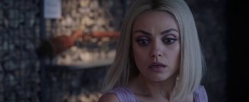 Movie still from “The Spy Who Dumped Me” (2018), directed by Susanna Fogel – A person with long blonde hair; Close Up shot, Over the shoulder angle
