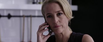 Movie still from “The Spy Who Dumped Me” (2018), directed by Susanna Fogel – A woman is talking on a cell phone; Close Up shot, Over the shoulder angle
