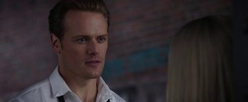 Movie still from “The Spy Who Dumped Me” (2018), directed by Susanna Fogel – A person wearing a white shirt; Close Up shot, Over the shoulder angle