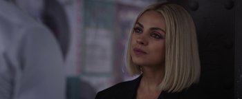 Movie still from “The Spy Who Dumped Me” (2018), directed by Susanna Fogel – A woman with blonde hair wearing a black jacket; Close Up shot, Over the shoulder angle