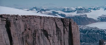 Movie still from “The Spy Who Loved Me” (1977), directed by Lewis Gilbert – A mountain with a bunch of snow on top of it; Extreme Wide shot, High angle