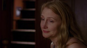 Movie still from “The Station Agent” (2003), directed by Tom McCarthy – A person with long blonde hair; Close Up shot, Over the shoulder angle