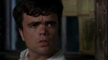 Movie still from “The Station Agent” (2003), directed by Tom McCarthy – A person looking at the camera; Close Up shot, Low angle