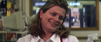 Movie still from “The Straight Story” (1999), directed by David Lynch – A person wearing a white shirt; Close Up shot, Low angle