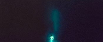 A light that is shining on a dark night