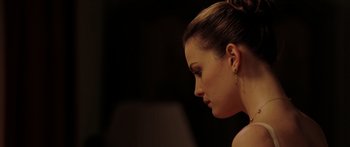 Movie still from “The Strangers” (2008), directed by Bryan Bertino – A woman's face in profile; Close Up shot, Over the shoulder angle