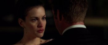 Movie still from “The Strangers” (2008), directed by Bryan Bertino – A man and a woman are looking at one another; Close Up shot, Over the shoulder angle