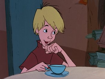 Movie still from “The Sword in the Stone” (1963), directed by Wolfgang Reitherman – A boy sitting at a table in front of a cup of coffee; Close Up shot, High angle
