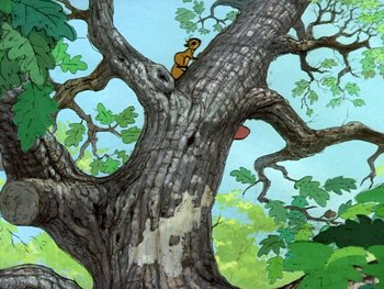 Movie still from “The Sword in the Stone” (1963), directed by Wolfgang Reitherman – A painting of a tree with a dog on it; Wide shot, Low angle