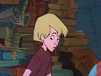 Movie still from “The Sword in the Stone” (1963), directed by Wolfgang Reitherman – A cartoon of a boy with blonde hair looking at the camera; Close Up shot, High angle