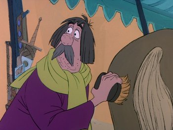 Movie still from “The Sword in the Stone” (1963), directed by Wolfgang Reitherman – An old man with long hair is brushing his hair with a brush; Medium shot, Over the shoulder angle