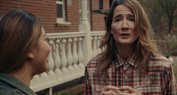 Movie still from “The Taking of Deborah Logan” (2014), directed by Adam Robitel – A woman and a girl are talking to each other outside; Close Up shot, Over the shoulder angle