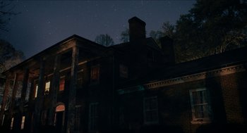 Movie still from “The Taking of Deborah Logan” (2014), directed by Adam Robitel – A night time photo of an old house; Extreme Wide shot, Low angle