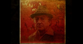 Movie still from “The Taking of Deborah Logan” (2014), directed by Adam Robitel – An older man wearing a hat and a jacket; Close Up shot, Low angle