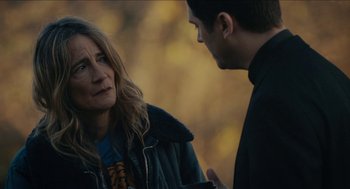 Movie still from “The Taking of Deborah Logan” (2014), directed by Adam Robitel – A woman and a man talking to each other outside; Close Up shot, Over the shoulder angle