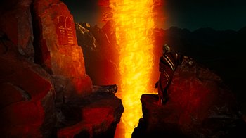 Movie still from “The Ten Commandments” (1956), directed by Cecil B. DeMille – A man standing in front of an erupting volcano; Wide shot, High angle