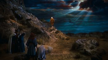 Movie still from “The Ten Commandments” (1956), directed by Cecil B. DeMille – A group of people standing on top of a hill; Extreme Wide shot, Low angle