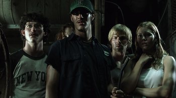 A group of young men standing next to each other