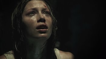 Movie still from “The Texas Chainsaw Massacre” (2003), directed by Marcus Nispel – A person with a wet face; Close Up shot, Low angle