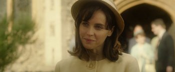 Movie still from “The Theory of Everything” (2014), directed by James Marsh – A person wearing a hat; Close Up shot, Over the shoulder angle