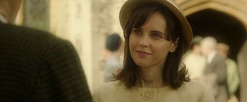 Movie still from “The Theory of Everything” (2014), directed by James Marsh – A person wearing a hat; Close Up shot, Over the shoulder angle