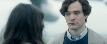 Movie still from “The Theory of Everything” (2014), directed by James Marsh – A man and a woman looking at one another; Close Up shot, Over the shoulder angle