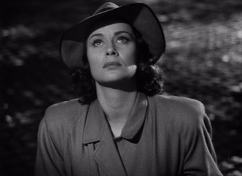 Movie still from “The Third Man” (1949), directed by Carol Reed – A black and white photo of a woman wearing a hat; Close Up shot, Low angle