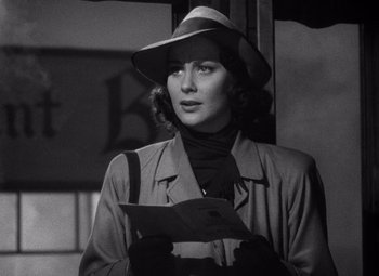 Movie still from “The Third Man” (1949), directed by Carol Reed – A black and white photo of a woman in a hat; Close Up shot, Low angle