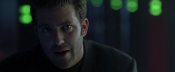 Movie still from “The Thirteenth Floor” (1999), directed by Josef Rusnak – A person with his eyes wide open; Close Up shot, Low angle