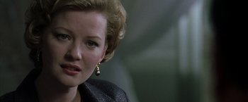 Movie still from “The Thirteenth Floor” (1999), directed by Josef Rusnak – A person wearing a jacket; Close Up shot, Over the shoulder angle