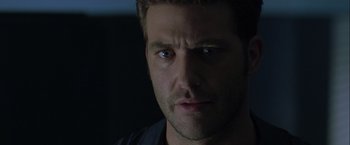 Movie still from “The Thirteenth Floor” (1999), directed by Josef Rusnak – A man's face in the dark; Close Up shot, Low angle