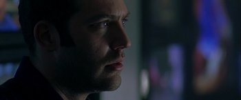 Movie still from “The Thirteenth Floor” (1999), directed by Josef Rusnak – A man's face in a dark room; Close Up shot, Low angle