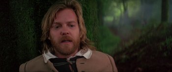 Movie still from “The Three Musketeers” (1993), directed by Stephen Herek – A person with long hair; Close Up shot, Low angle