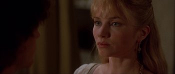 Movie still from “The Three Musketeers” (1993), directed by Stephen Herek – A person with blonde hair and blue eyes; Close Up shot, Over the shoulder angle