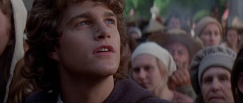 Movie still from “The Three Musketeers” (1993), directed by Stephen Herek – A person looking up at something; Close Up shot, Low angle