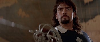 Movie still from “The Three Musketeers” (1993), directed by Stephen Herek – A person with a beard; Close Up shot, Low angle