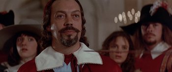Movie still from “The Three Musketeers” (1993), directed by Stephen Herek – A person with a beard and mustache; Close Up shot, Low angle