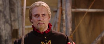 Movie still from “The Three Musketeers” (2011), directed by Paul W.S. Anderson – A person with a beard; Close Up shot, Over the shoulder angle