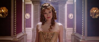 Movie still from “The Three Musketeers” (2011), directed by Paul W.S. Anderson – A woman in a corset with long curly hair; Close Up shot, Low angle