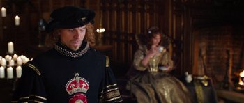 Movie still from “The Three Musketeers” (2011), directed by Paul W.S. Anderson – A man and a woman dressed in medieval clothing; Medium shot, Over the shoulder angle