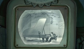 Movie still from “The Triplets of Belleville” (2003), directed by Sylvain Chomet – A man sitting in front of a grand piano in a room; Wide shot, High angle